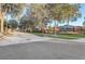 View of the brick sign at the gated entrance to the Forestbrooke community with mature landscaping at 264 Wallrock Ct, Ocoee, FL 34761