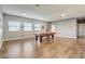 Game room with pool table and wood floors at 264 Wallrock Ct, Ocoee, FL 34761