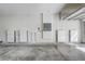 Garage interior showing a wall mounted Tesla power supply system at 264 Wallrock Ct, Ocoee, FL 34761
