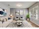 Living room with hardwood floors and neutral decor at 264 Wallrock Ct, Ocoee, FL 34761