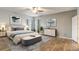 Main bedroom with wood floors and stylish decor at 264 Wallrock Ct, Ocoee, FL 34761