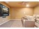 Home theater with recliner seats and projector at 264 Wallrock Ct, Ocoee, FL 34761
