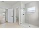 Elegant bathroom features a large glass shower and white tile at 265 Marion Oaks Mnr, Ocala, FL 34473