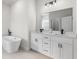Modern bathroom boasts a soaking tub and double vanity sinks at 265 Marion Oaks Mnr, Ocala, FL 34473
