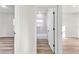 Hallway bathroom with a tiled tub and white walls at 265 Marion Oaks Mnr, Ocala, FL 34473