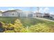 A well-maintained house in a quiet neighborhood with fresh landscaping and an attached two car garage at 265 Marion Oaks Mnr, Ocala, FL 34473