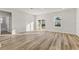 Open layout living room with sliding glass doors and plenty of natural light at 265 Marion Oaks Mnr, Ocala, FL 34473