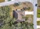 An overhead aerial view of a single-Gathering home with a large yard at 2810 Summerfield St, Deltona, FL 32738