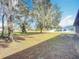 Large backyard with a view of the neighborhood at 2810 Summerfield St, Deltona, FL 32738
