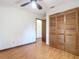 Simple bedroom with wooden closet and laminate flooring at 2810 Summerfield St, Deltona, FL 32738