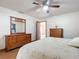 Bedroom with wooden dresser and en-suite bathroom at 2810 Summerfield St, Deltona, FL 32738