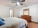 Bedroom with wooden dresser and en-suite bathroom at 2810 Summerfield St, Deltona, FL 32738