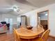 Open dining room with view into living room and kitchen at 2810 Summerfield St, Deltona, FL 32738