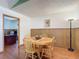 Charming dining room with wood-paneled walls at 2810 Summerfield St, Deltona, FL 32738