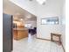 Kitchen with a breakfast bar and view into living room at 2810 Summerfield St, Deltona, FL 32738