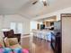 Open concept kitchen and living room, hardwood floors at 2810 Summerfield St, Deltona, FL 32738