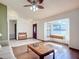 Living room with hardwood floors, a sofa, and bay window at 2810 Summerfield St, Deltona, FL 32738