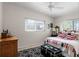 Charming bedroom with updated bedding and plenty of natural light at 3431 Wilder Ln, Orlando, FL 32804