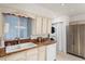 Kitchen boasts white cabinets, granite counters, and a built-in dishwasher at 3431 Wilder Ln, Orlando, FL 32804