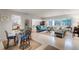 Bright and airy living room with seating area and dining space at 3431 Wilder Ln, Orlando, FL 32804