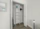 White closet with shelving and hanging rods at 3724 S Atlantic Ave # 20, Daytona Beach, FL 32118
