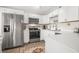 Clean kitchen, white cabinets, stainless steel appliances at 3724 S Atlantic Ave # 20, Daytona Beach, FL 32118