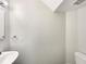 Small half bathroom with a sink and toilet at 4047 Sw 51St Ct, Ocala, FL 34474