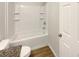 Clean bathroom with a shower/tub combo and granite countertop at 4047 Sw 51St Ct, Ocala, FL 34474