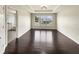 Spacious bedroom with dark hardwood flooring at 4047 Sw 51St Ct, Ocala, FL 34474