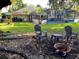 Serene backyard with fire pit and pool view at 4938 Raylene Way, St Cloud, FL 34771