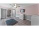 Bright bedroom with a ceiling fan and walk-in closet at 4938 Raylene Way, St Cloud, FL 34771