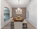 Bright dining room with hardwood floors and a chandelier at 4938 Raylene Way, St Cloud, FL 34771