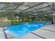 Inviting screened pool with waterfall feature at 4938 Raylene Way, St Cloud, FL 34771