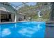 Refreshing screened pool in a sunny backyard at 4938 Raylene Way, St Cloud, FL 34771