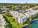 Aerial view of condo building near lake at 526 Orange Dr # 37, Altamonte Springs, FL 32701