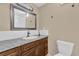 Modern bathroom with vanity, mirror and toilet at 526 Orange Dr # 37, Altamonte Springs, FL 32701