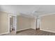 Bedroom with hardwood floors and access to bathroom at 526 Orange Dr # 37, Altamonte Springs, FL 32701