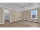 Bedroom with hardwood floors, closet and window at 526 Orange Dr # 37, Altamonte Springs, FL 32701