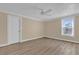 Bright bedroom with hardwood floors and window at 526 Orange Dr # 37, Altamonte Springs, FL 32701