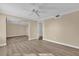 Bedroom with mirrored closet and hardwood floor at 526 Orange Dr # 37, Altamonte Springs, FL 32701