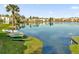 Calm lake with canoes and lush greenery at 526 Orange Dr # 37, Altamonte Springs, FL 32701