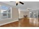 Living room with hardwood floors, ceiling fan, and balcony access at 526 Orange Dr # 37, Altamonte Springs, FL 32701