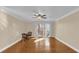 Living room with hardwood floors and sliding glass doors at 526 Orange Dr # 37, Altamonte Springs, FL 32701