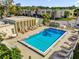 Community pool with lounge chairs and surrounding landscaping at 526 Orange Dr # 37, Altamonte Springs, FL 32701