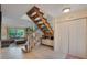 Entryway with staircase and built-in shelving at 533 Moree Loop, Winter Springs, FL 32708