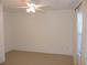 Spacious bedroom with ceiling fan and window coverings at 870 Regatta Bay Dr # 4-103, Orange City, FL 32763