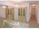 Dining area with mirrored wall and built-in hutch at 870 Regatta Bay Dr # 4-103, Orange City, FL 32763