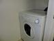 Stackable washer and dryer in a convenient laundry room at 870 Regatta Bay Dr # 4-103, Orange City, FL 32763