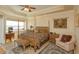Elegant main bedroom with a four-poster bed and water view at 8755 The Esplanade # 103, Orlando, FL 32836