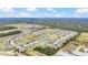 Aerial view of Compass Landing neighborhood, showing homes and community features at 936 Jetway Street, Orange City, FL 32763